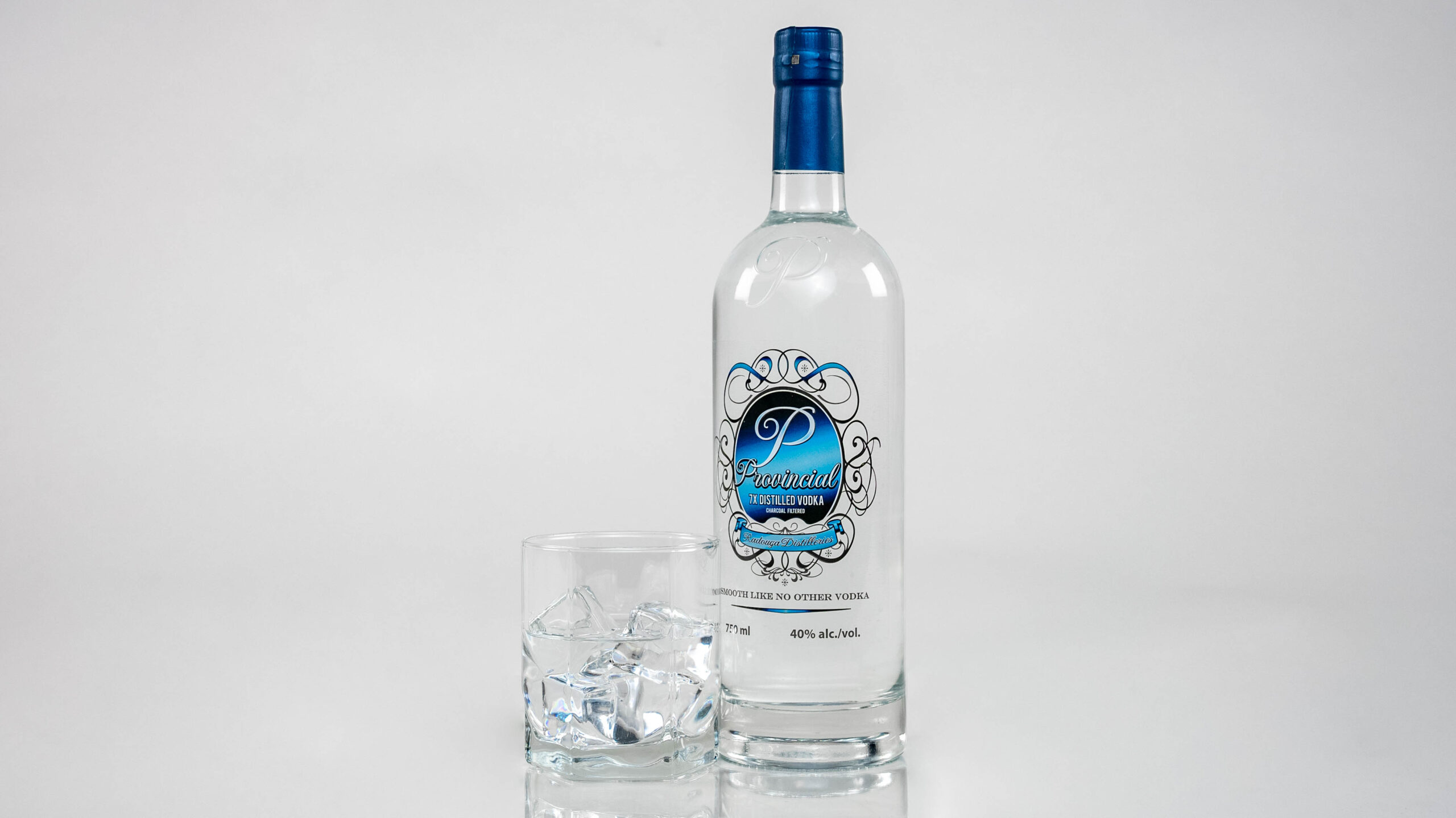studio photo of vodka and glass with ice