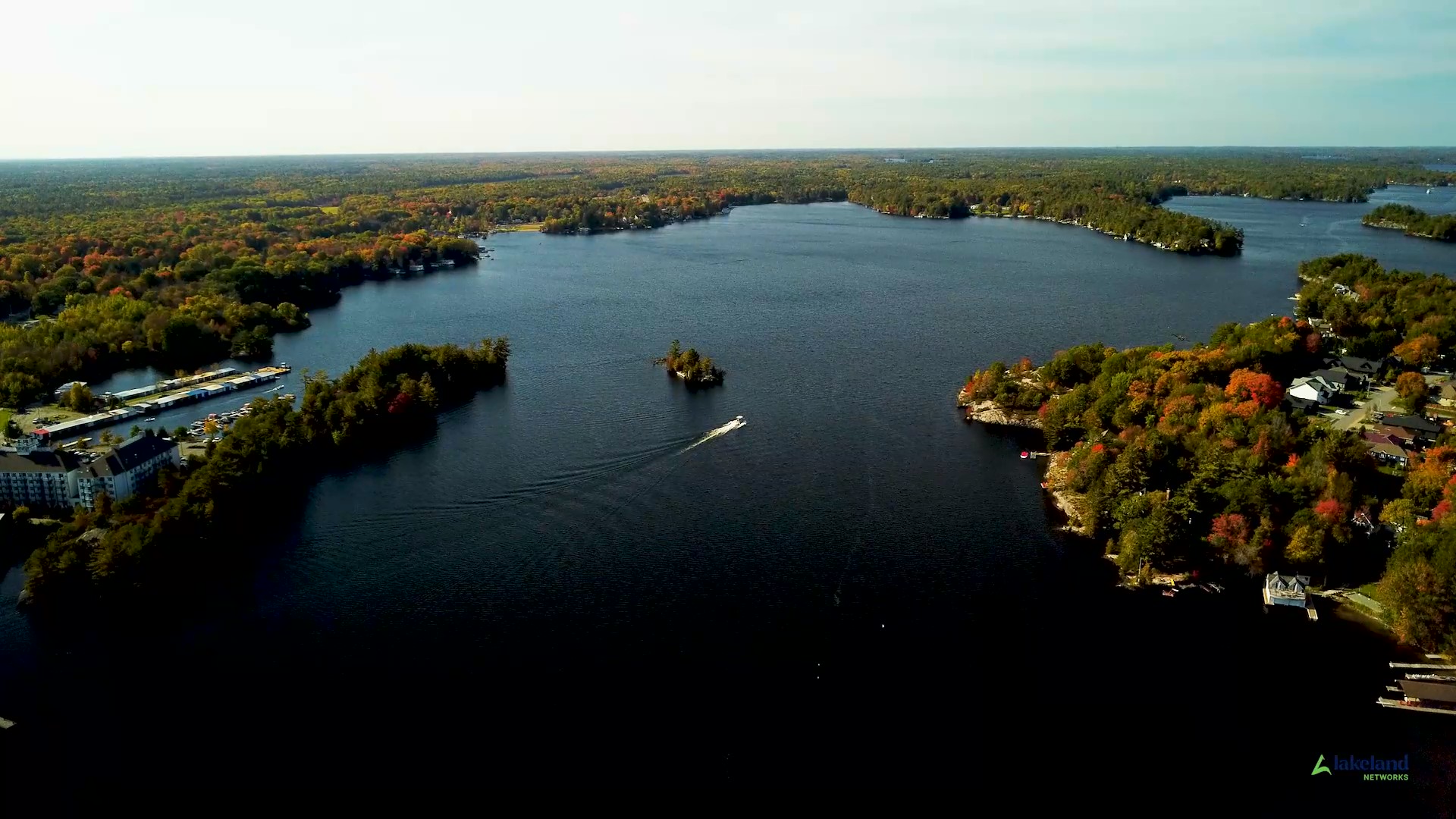 aerial photo of boat on lake